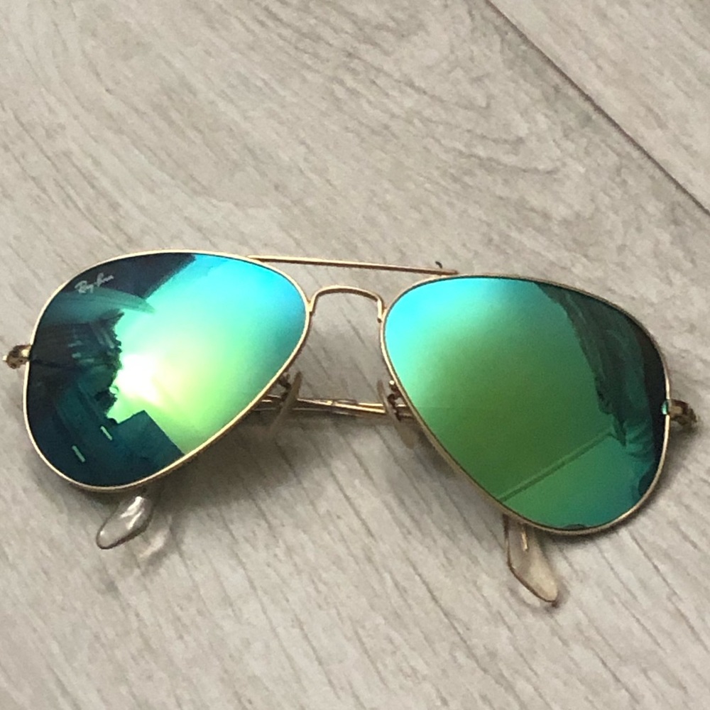 Teal ray bans sunglasses with the case